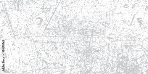 Scratched and distressed white background with intricate grey lines and speckles, gritty texture for grunge or vintage design overlays.