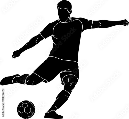 Silhouette of a football player in full motion performing a powerful strike on the ball