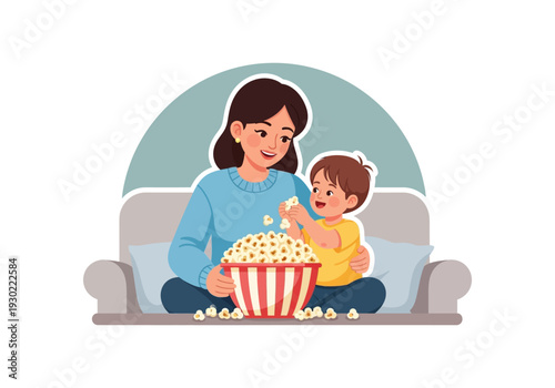 A mother and child enjoying popcorn together on a couch, sharing a happy moment.