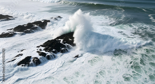 Aerial View of Powerful Ocean Waves Crashing Against Dark Coastal Rocks with Detailed White Sea Foam, Dramatic Natural Seascape in Ultra Realistic 4K