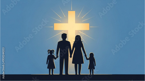 Family of four standing together holding hands in front of a large illuminated cross