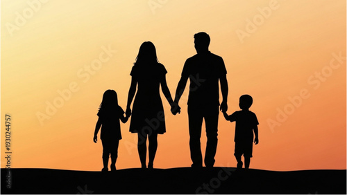 Family of four holding hands and walking together at sunset on a hill
