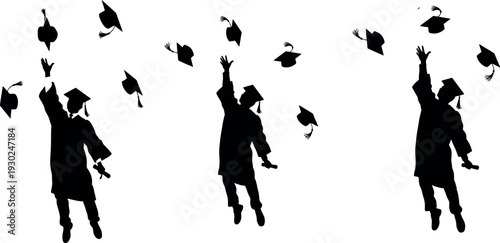 Graduates celebrating with tossed mortarboards in air