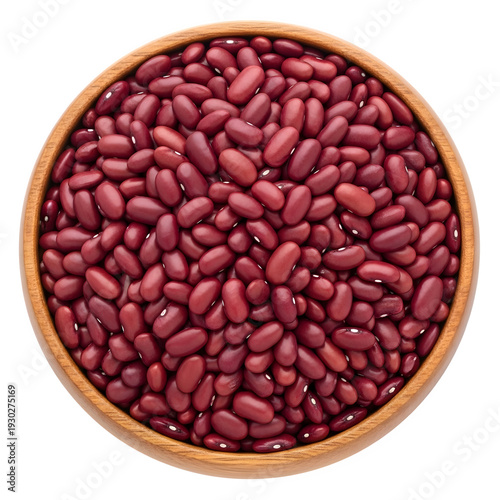 Raw red kidney beans spilling from wooden bowl isolated on transparent background