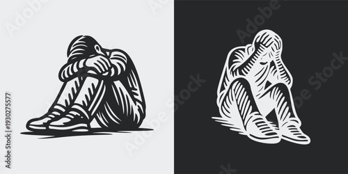 Depressed Person Sitting Alone with Head in Hands