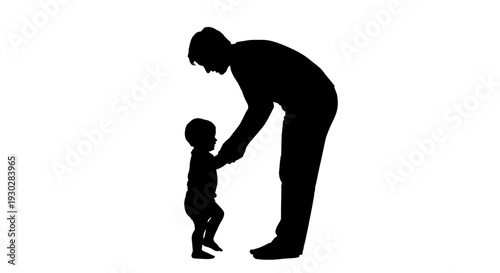 Silhouette of adult holding toddler.