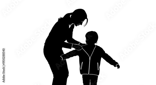 Woman helping little boy walk.