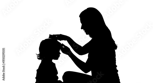 Woman combing little girl hair.