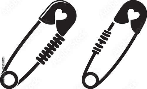 Pair of black safety pins with heart details, representing security and affection