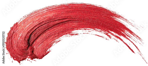 Curved brushstroke of red paint with visible texture on a black background