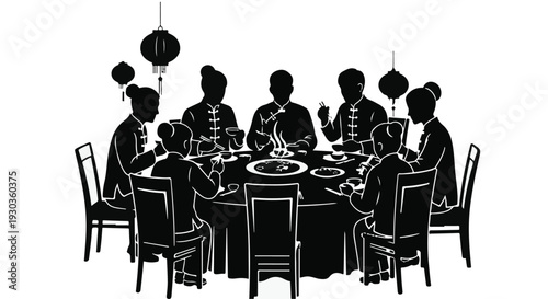 Family gathers for a festive meal around a round table, sharing food and conversation.