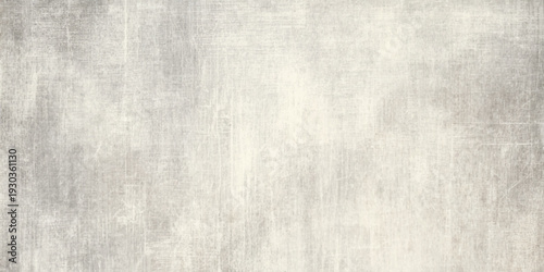 A grey brushed metal plate texture featuring a rough grunge pattern on an aged vintage surface with a light textured design