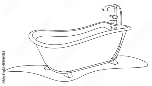 Modern freestanding bathtub with sleek faucet and minimalist design