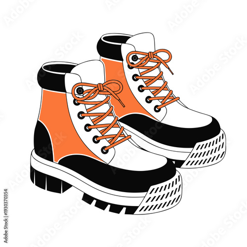 A pair of orange and white boots with black soles