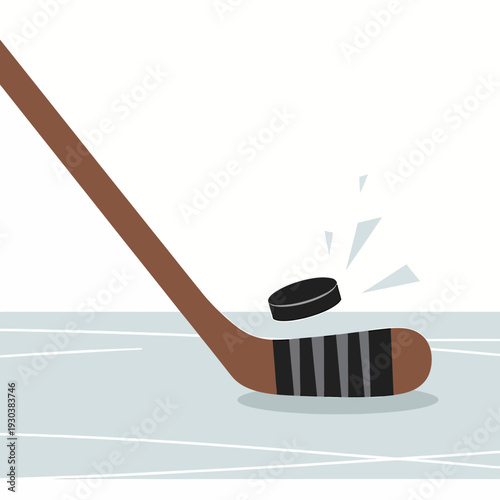 Macro view of hockey puck flying off the stick