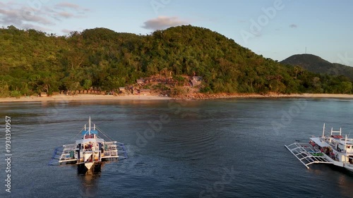 Drone aerial view of KMAAL campsite in Linapacan near Coron in The Philippines.