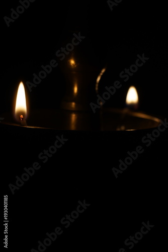 burning candle in the dark