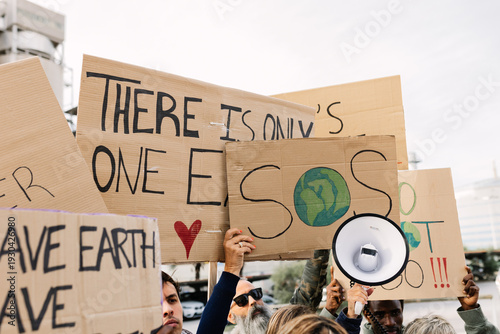 Принти на полотні Group of activists raising cardboard placards during an environmental demonstrat