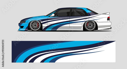 Side view of sleek blue and white race car with bold racing stripes and decals.