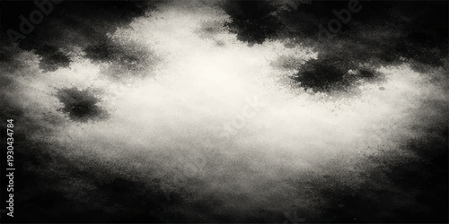 A dark storm of black and white smoke creates a moody cloudscape texture with mist and fog against a night sky backdrop for a dramatic nature design