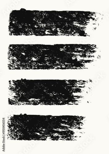 Collection of grunge brush strokes isolated on light background, perfect for modern design, distressed textures, banners, and creative branding projects.