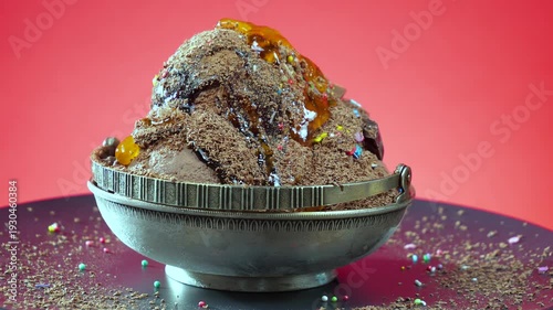 Wallpaper Mural Chocolate ice cream in a metal bowl, sprinkled with edible confetti, slowly rotates against a bright background. Torontodigital.ca