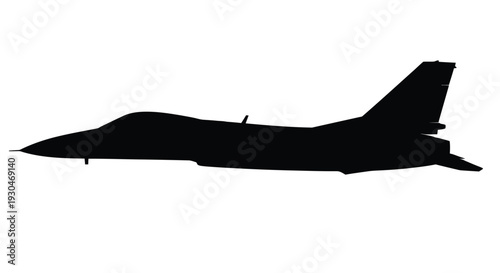 A dark silhouette of a fighter jet in mid flight silhouette