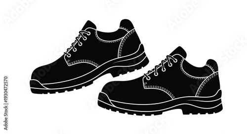 A pair of black and white work boots displayed at a slight angle