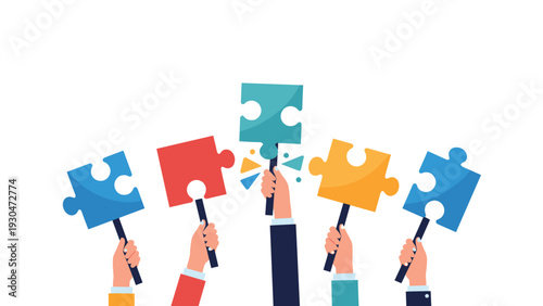 Five hands lift up colorful puzzle pieces that fit together as a single unit to show the power of business teamwork and collaboration.