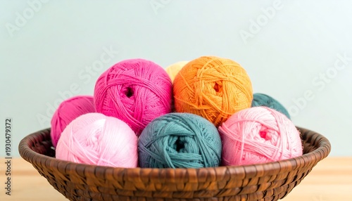 Colorful yarn balls in a woven basket