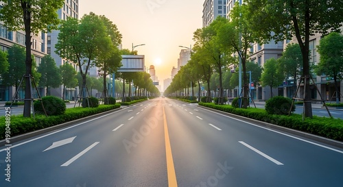 Empty urban highway with trees and buildings