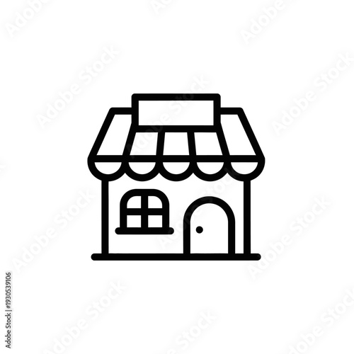 Charming Small Business Storefront with Bright Canopy and Cozy Atmosphere