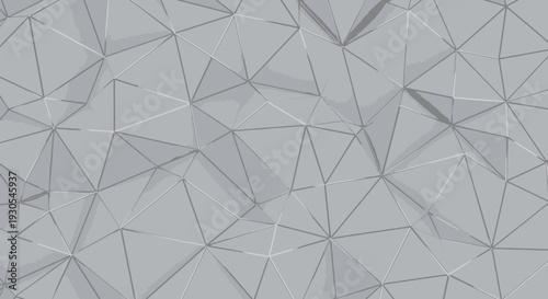 Geometric pattern of white and gray triangles forming a mosaic.