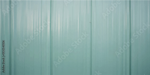 Shiny emerald green metallic background texture with vertical light reflections