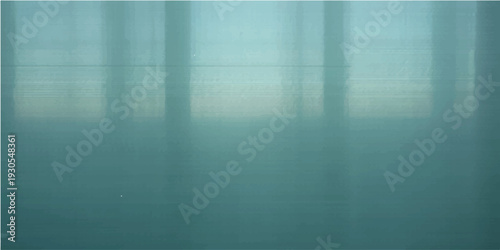 Brushed teal metal surface with subtle light reflections