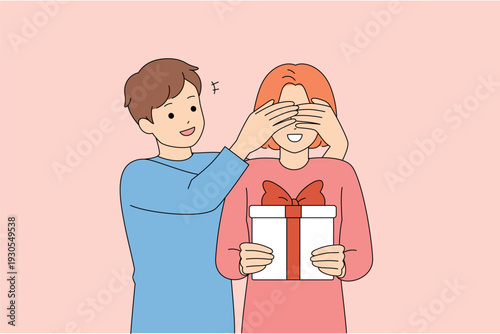 Gentle Surprise Gesture. An Intimate Scene Where Man Presents Surprise Gift To Woman Indoors