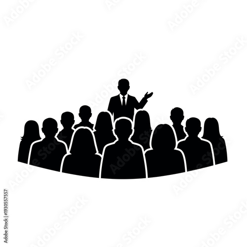 Speaker addressing an audience in a business meeting or conference.