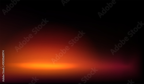 Warm orange and yellow light flare on dark background. Soft horizontal glowing spotlight effect for design overlay. Abstract fire or sunset color gradient beam.