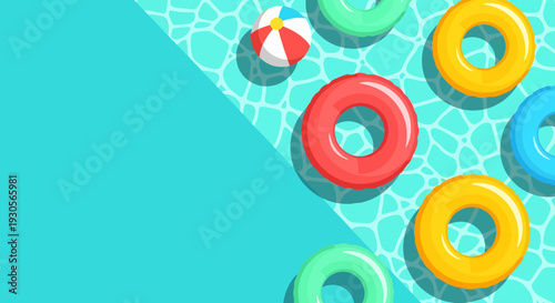 Summer vacation by pool with beach ball and inflatables on sunny holiday