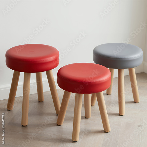 Wallpaper Mural Three Modern Minimalist Stools with Red and Gray Upholstered Seats on Light Wooden Legs for Home or Office Use in Clean Contemporary Interior Design Torontodigital.ca