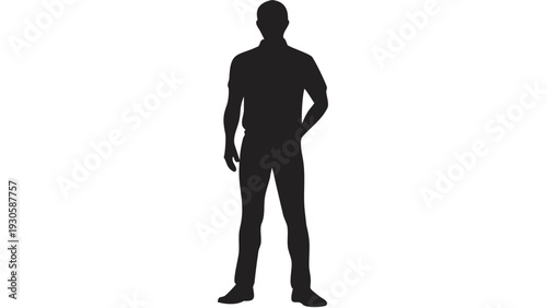 Confident man standing with hand on hip in casual outfit