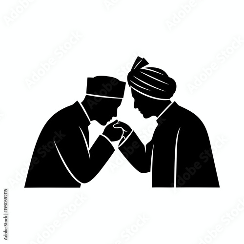 Silhouette of a younger man in traditional clothing kissing the hand of an elder to show deep respect and devotion