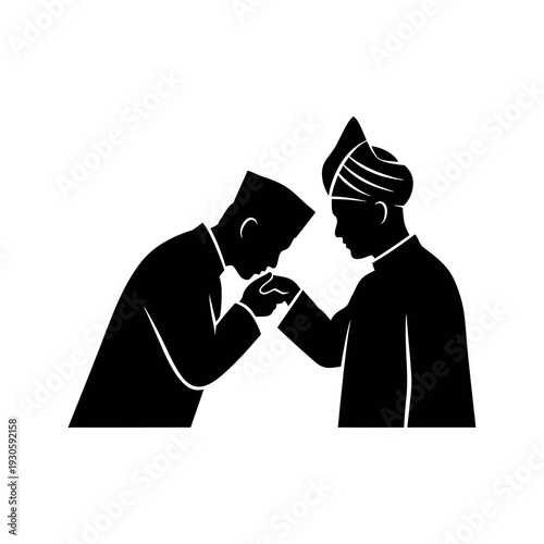 Silhouette of a younger man wearing a songkok kissing the hand of a patriarch in traditional headgear to show cultural respect and honor