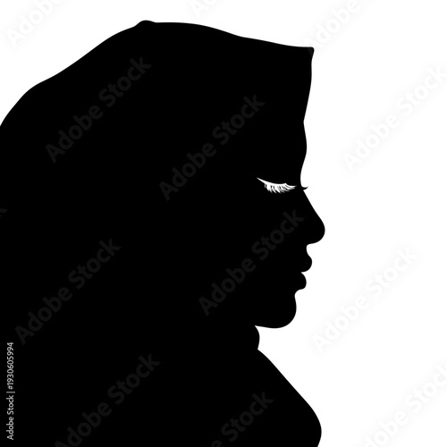 Silhouette of a Woman Wearing a Hijab with Dramatic Lighting.