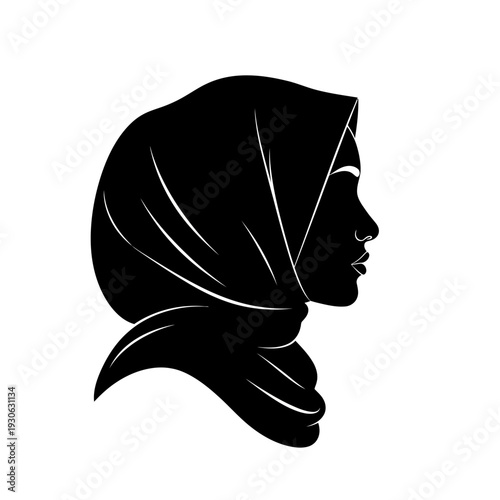 Elegant Silhouette of a Woman Wearing a Hijab in Profile.