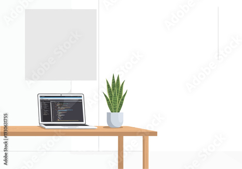 Laptop and Potted Plant on Table.
