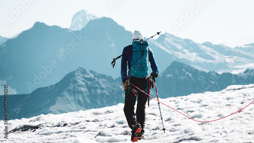 Alpine Guide Leading a Rope Party Down a Mont Blanc Glacier Toward the Valais Alps on the Haute Route