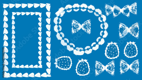 Collection of white textured jewelry and decorative elements on blue