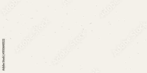 Cream colored background with scattered dark specks and minimal texture