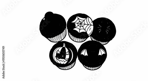 Five festive Halloween cupcakes, one plain black, three decorated